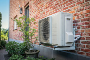 A heat pump installed outside of a home.